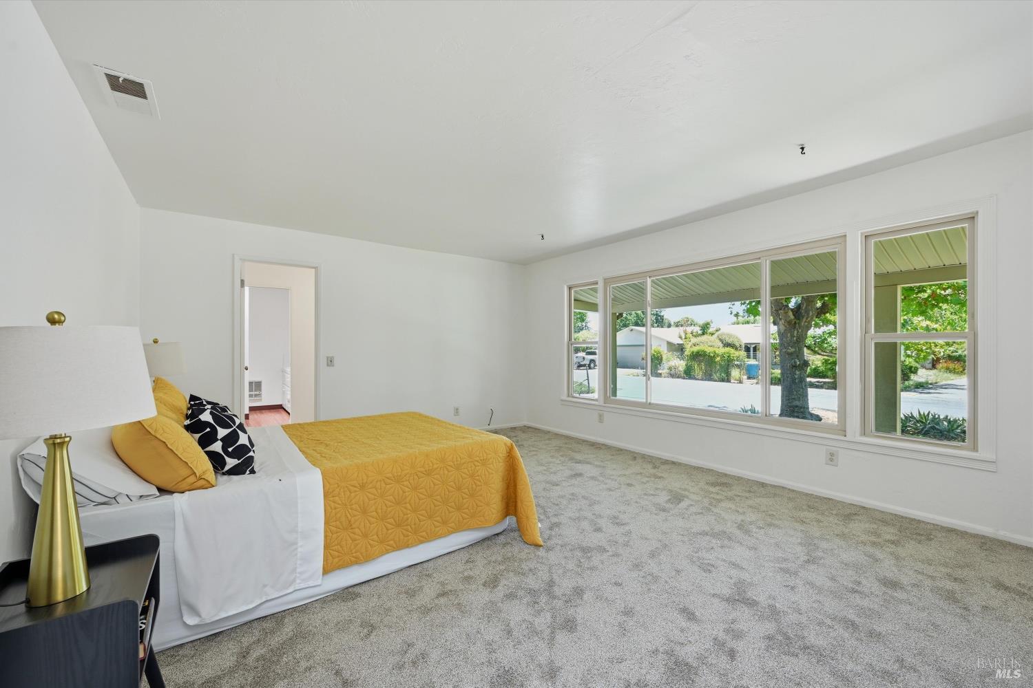 4941 Hansen Drive Santa Rosa, CA 95409 - Photo 6 of 35 Original living room was converted years ago into a primary bedroom with dressing room and bath