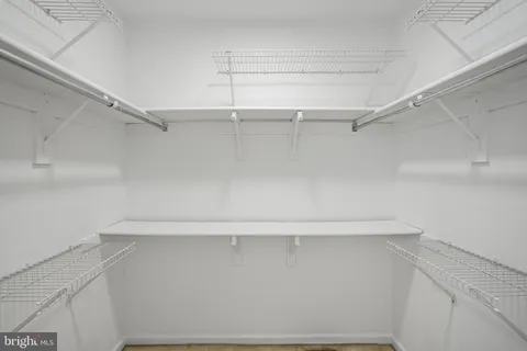 a view of an empty walk in closet