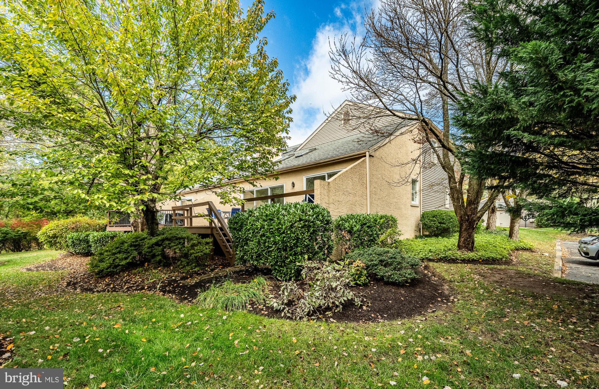 6 Wingstone Lane Devon, PA 19333 - Photo 36 of 38 Charming home nestled among vibrant greenery.