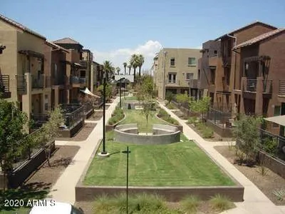 a view of a water fountain in front of building