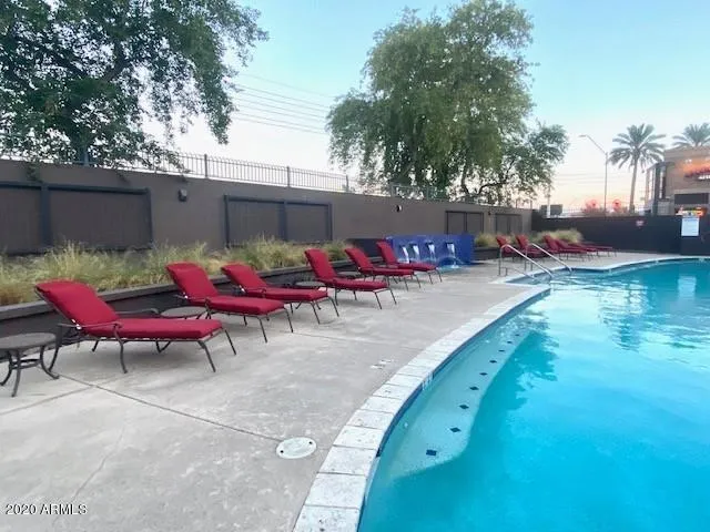 an outdoor space with furniture