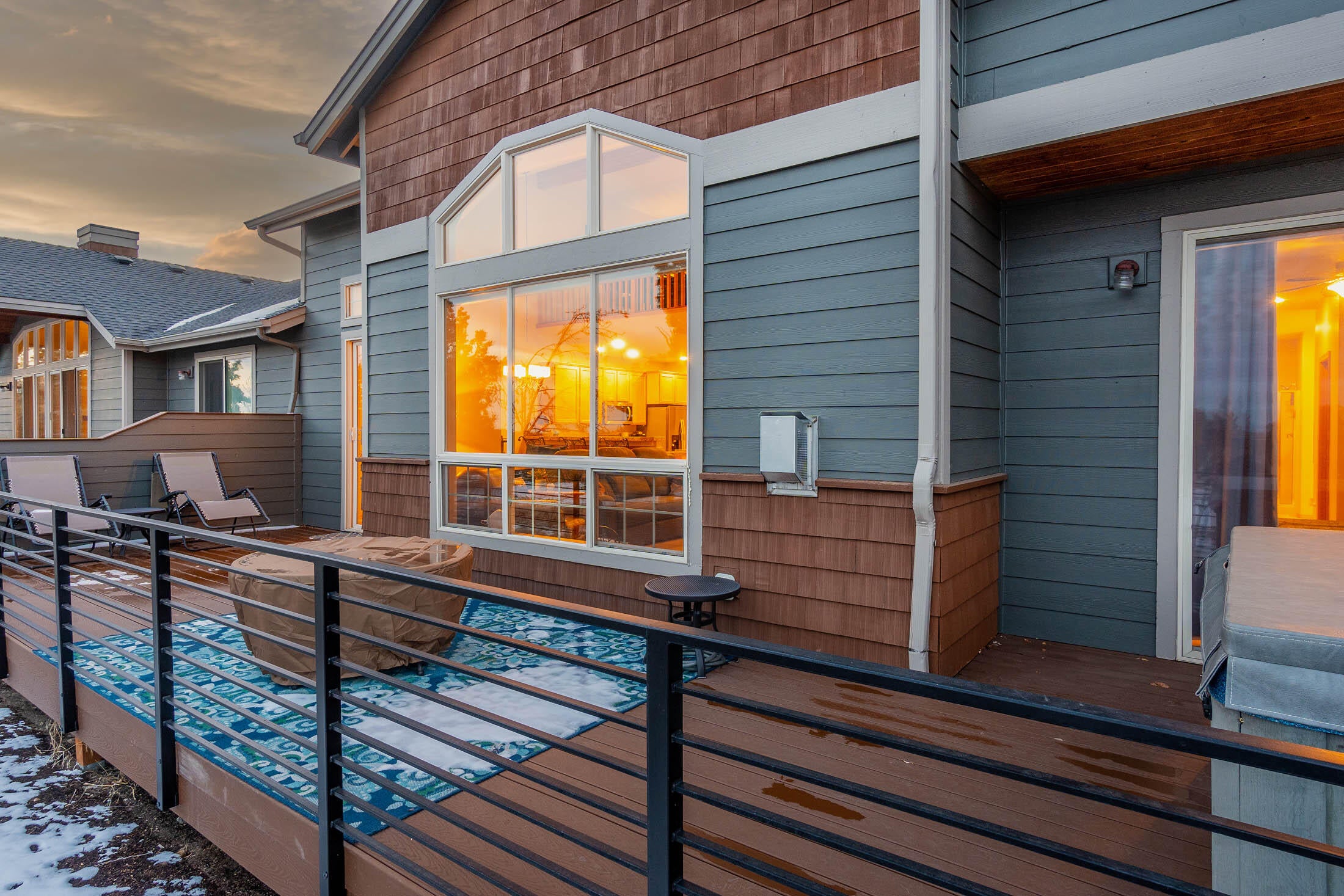 8384 Forest Ridge Loop Redmond, OR 97756 - Photo 20 of 53 Large back deck overlooking the greens with plenty of room to entertain, lounge in the sun or enjoy the hot tub.