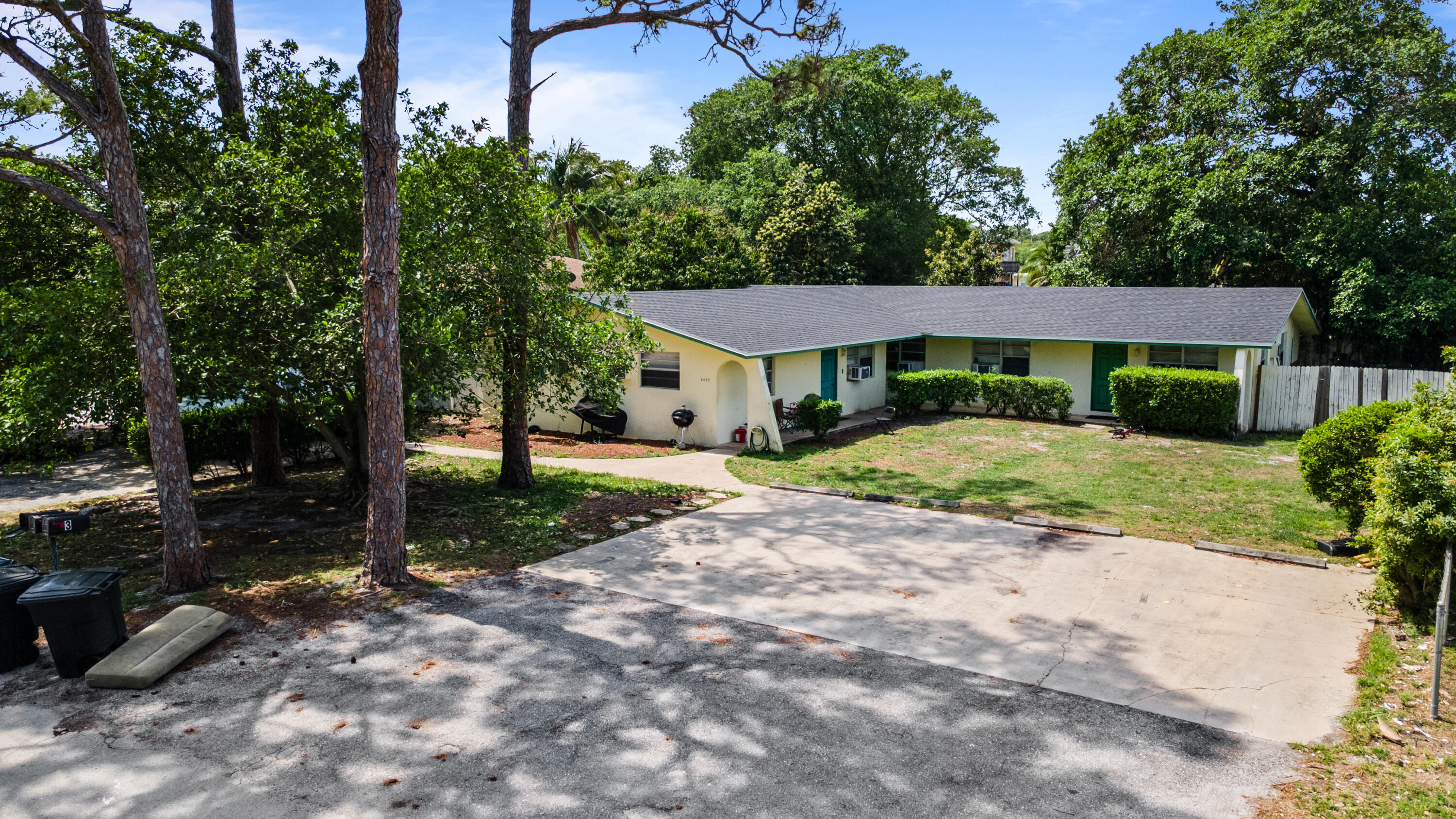 4453 Stevens Road Lake Worth Beach, FL 33461 - Photo 20 of 67 a view of a house with a yard