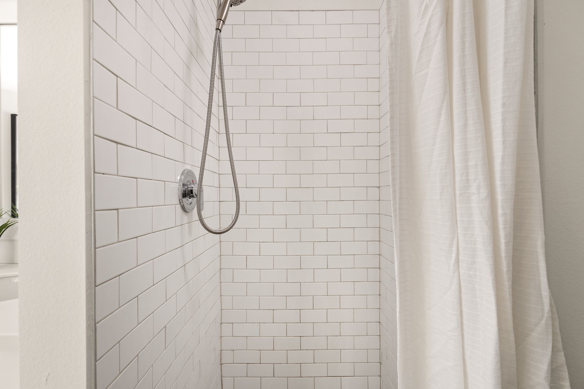 1301 Chicon Street, Unit 203 Austin, TX 78702 - Photo 13 of 27 a bathroom with a shower