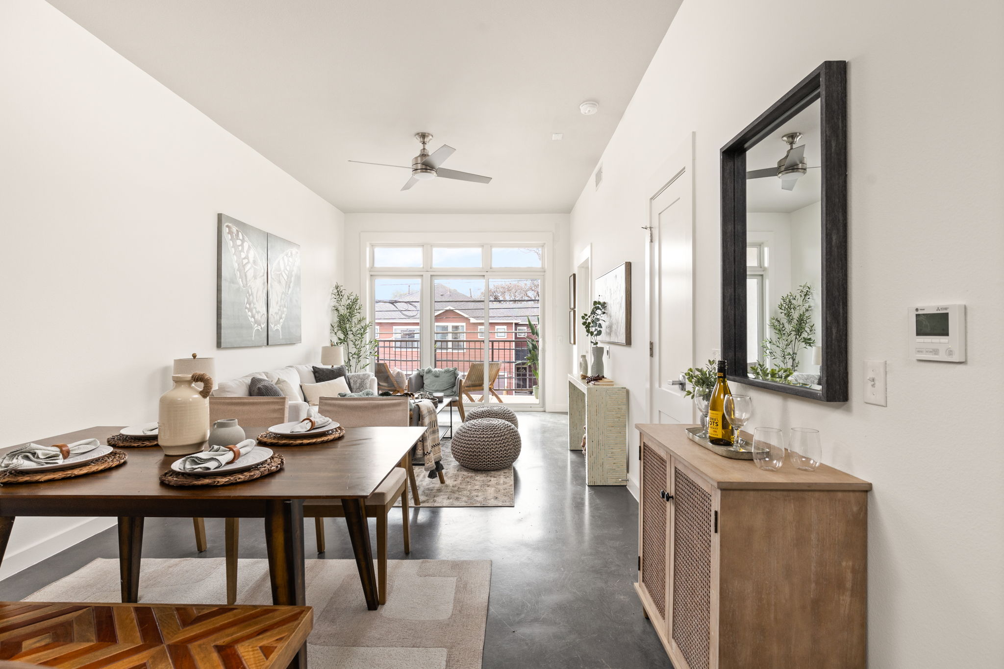 1301 Chicon Street, Unit 203 Austin, TX 78702 - Photo 8 of 27 a view of a a dining room with furniture window and wooden floor