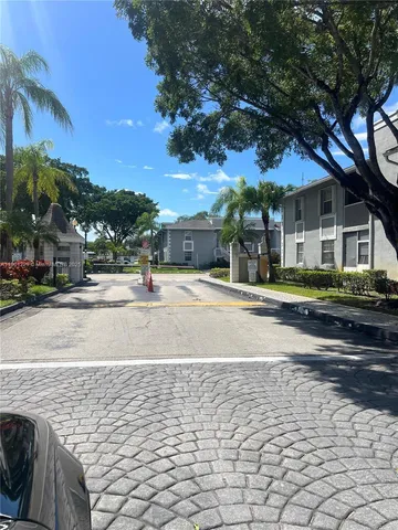 a view of a building with a street