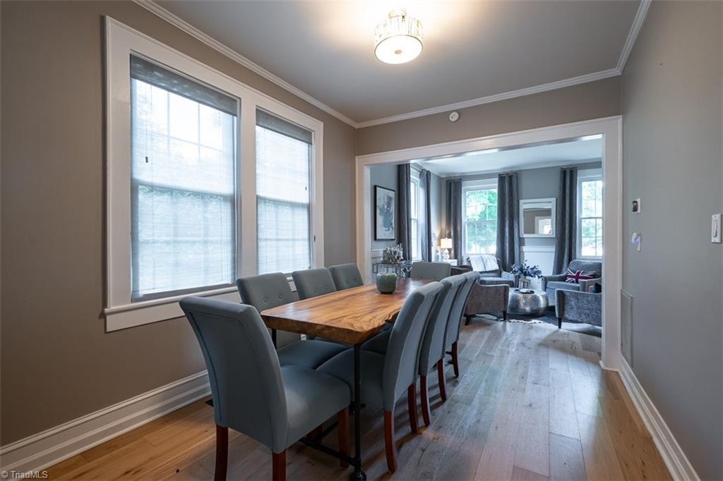 113 Gwyn Avenue Elkin, NC 28621 - Photo 11 of 39 Dining room opens to sitting room and is ideal for entertaining.
