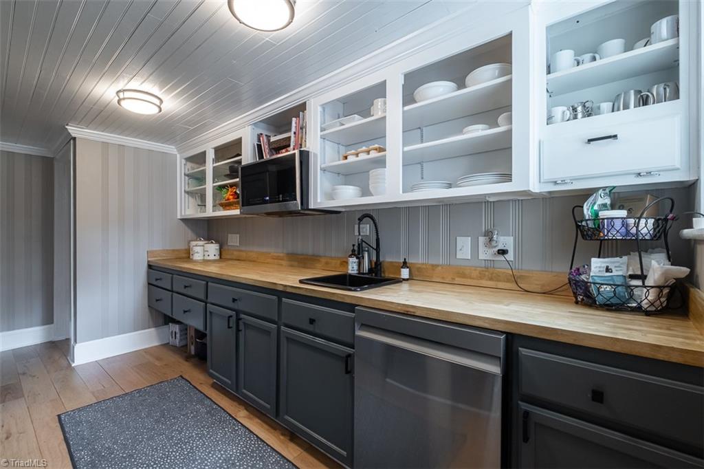 113 Gwyn Avenue Elkin, NC 28621 - Photo 14 of 39 Butler's pantry is located off kitchen.