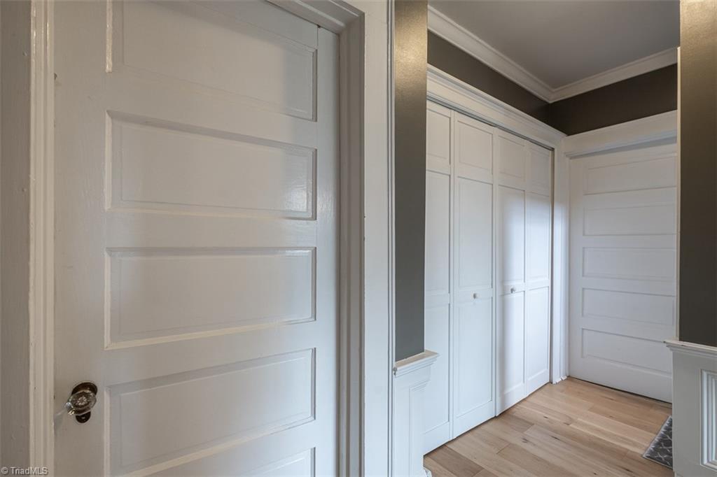 113 Gwyn Avenue Elkin, NC 28621 - Photo 19 of 39 Hallway on second level. Washer/dryer connection located in double door closet.