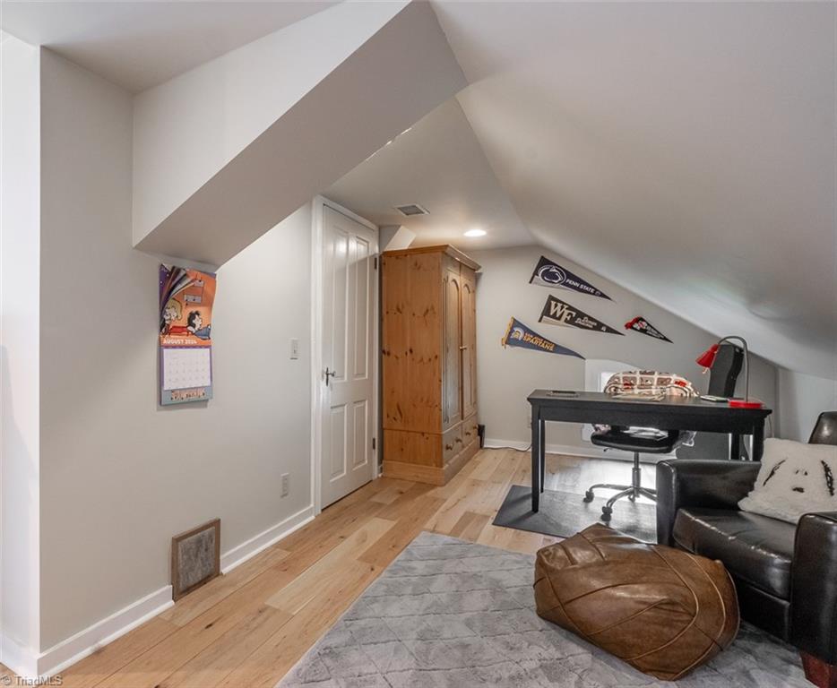 113 Gwyn Avenue Elkin, NC 28621 - Photo 31 of 39 Spacious room on third level that can be used as bedroom, office, playroom or work out room.