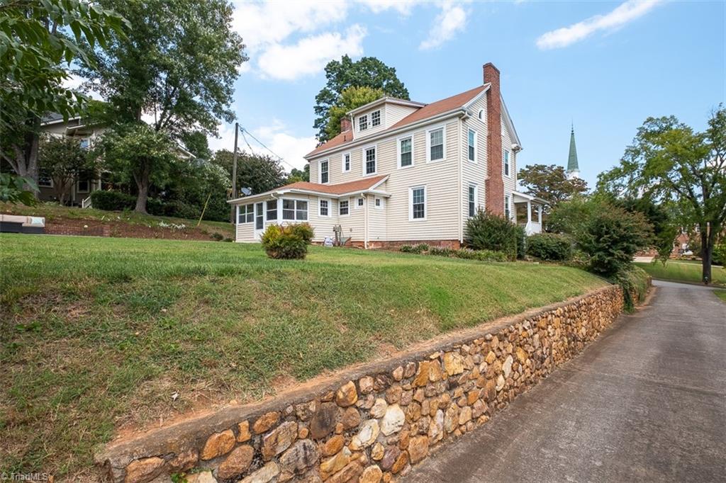 113 Gwyn Avenue Elkin, NC 28621 - Photo 34 of 39 Rear view of home with vinyl siding for lower maintenance
