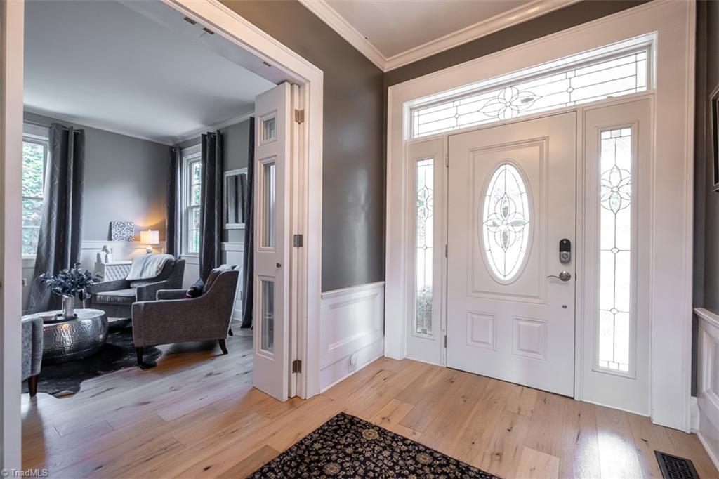 113 Gwyn Avenue Elkin, NC 28621 - Photo 6 of 39 Foyer looking toward front door and sitting room.