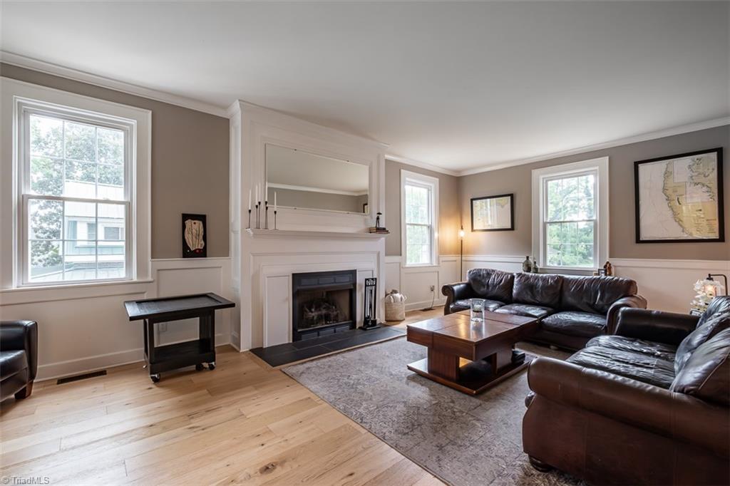 113 Gwyn Avenue Elkin, NC 28621 - Photo 7 of 39 Spacious living room with gas-burning fireplace.