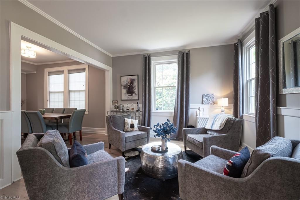113 Gwyn Avenue Elkin, NC 28621 - Photo 9 of 39 Sitting room open to dining room.