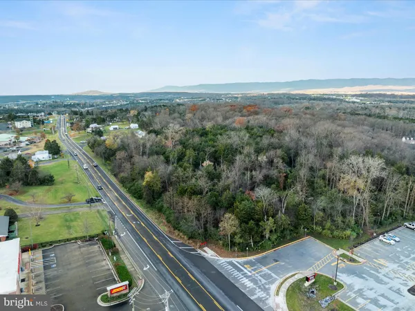 an aerial view of residential house with outdoor space
