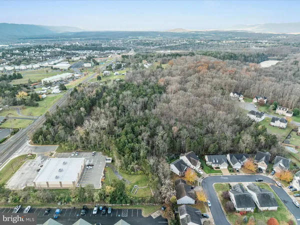 an aerial view of a city with lots of residential buildings