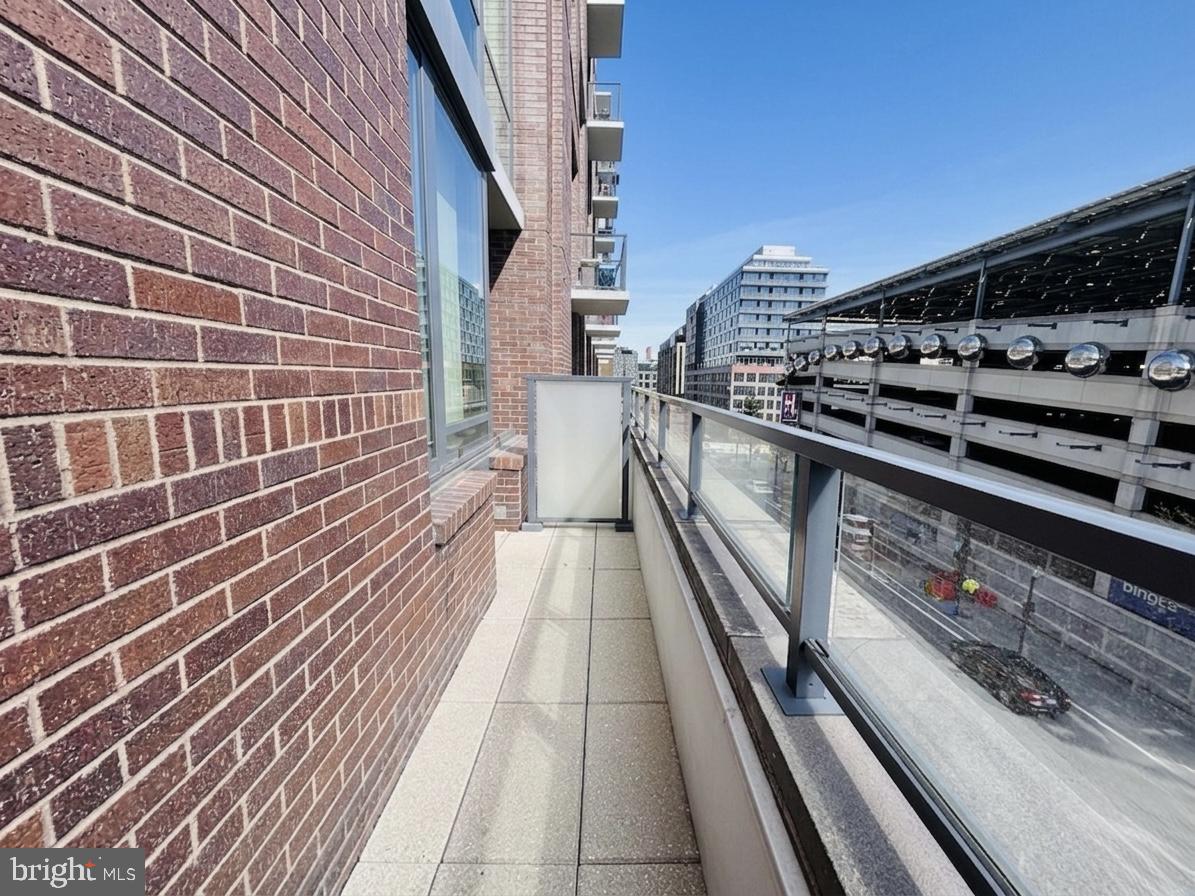 70 N Street Southeast, Unit N301 Washington, DC 20003 - Photo 12 of 47 a view of balcony with stainless steel appliances