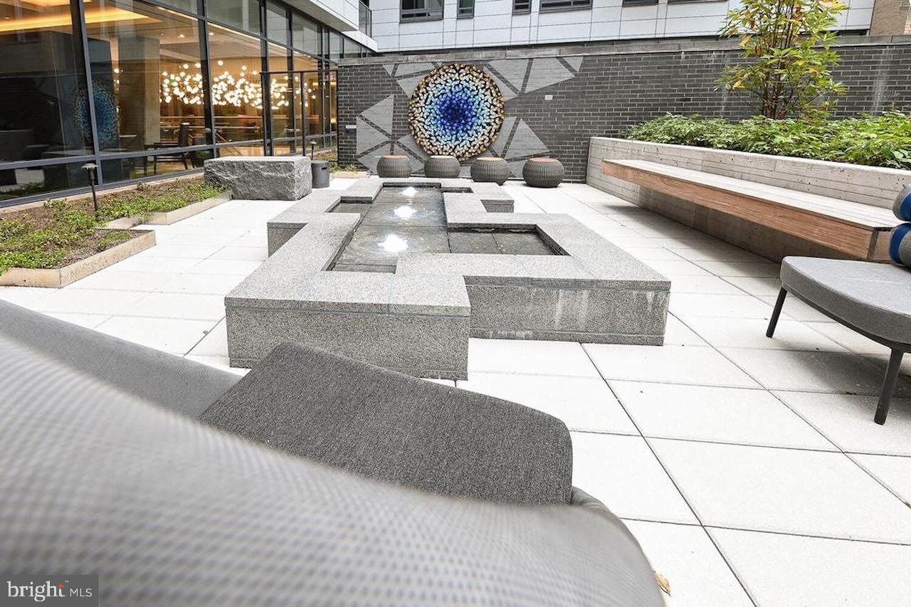 70 N Street Southeast, Unit N301 Washington, DC 20003 - Photo 25 of 47 a view of a swimming pool with outdoor seating