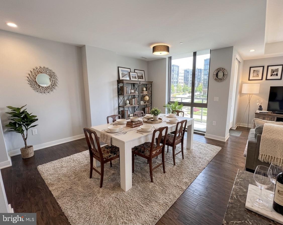 70 N Street Southeast, Unit N301 Washington, DC 20003 - Photo 8 of 47 a view of a dining room with furniture and wooden floor