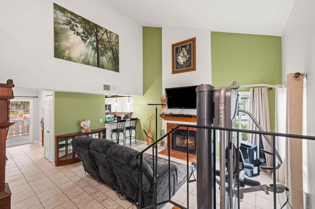 9690 Bundy Drive Santee, CA 92071 - Photo 12 of 66 a living room with furniture and a flat screen tv