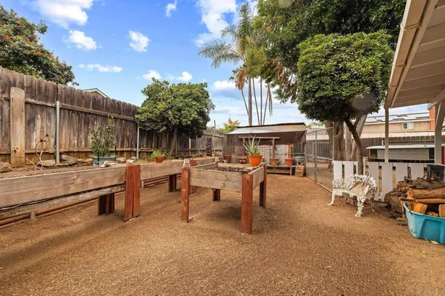 a garden view with a sitting space