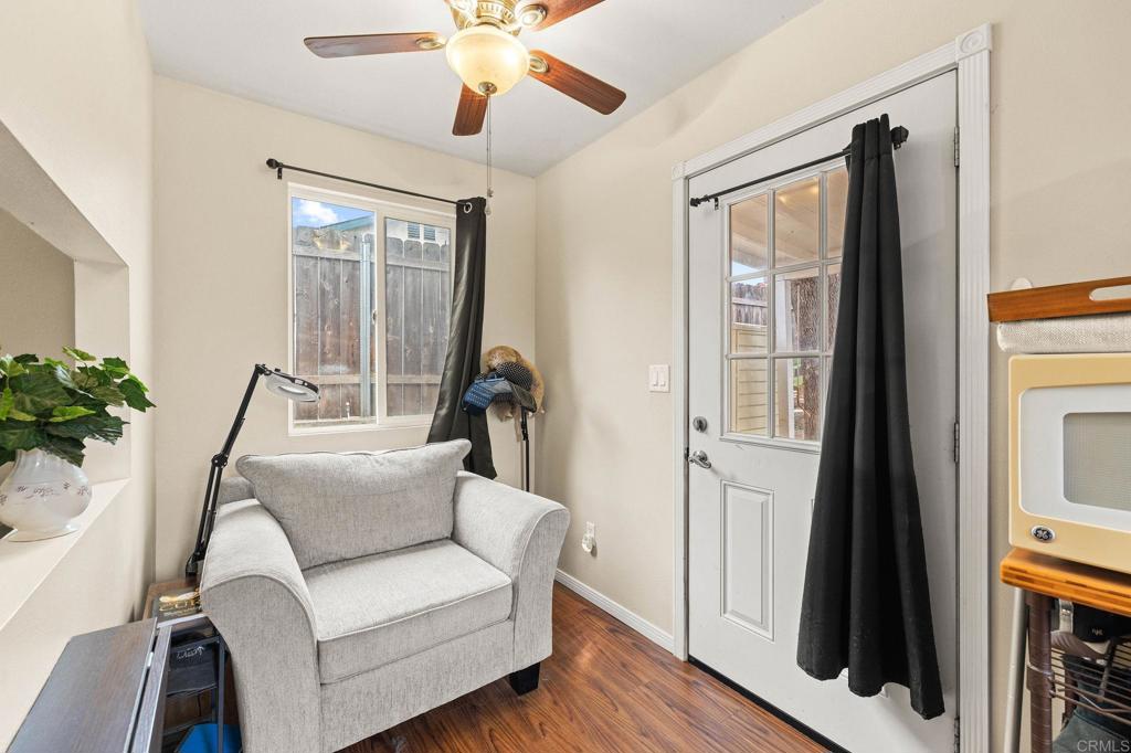 9690 Bundy Drive Santee, CA 92071 - Photo 48 of 66 a living room with furniture and a flat screen tv