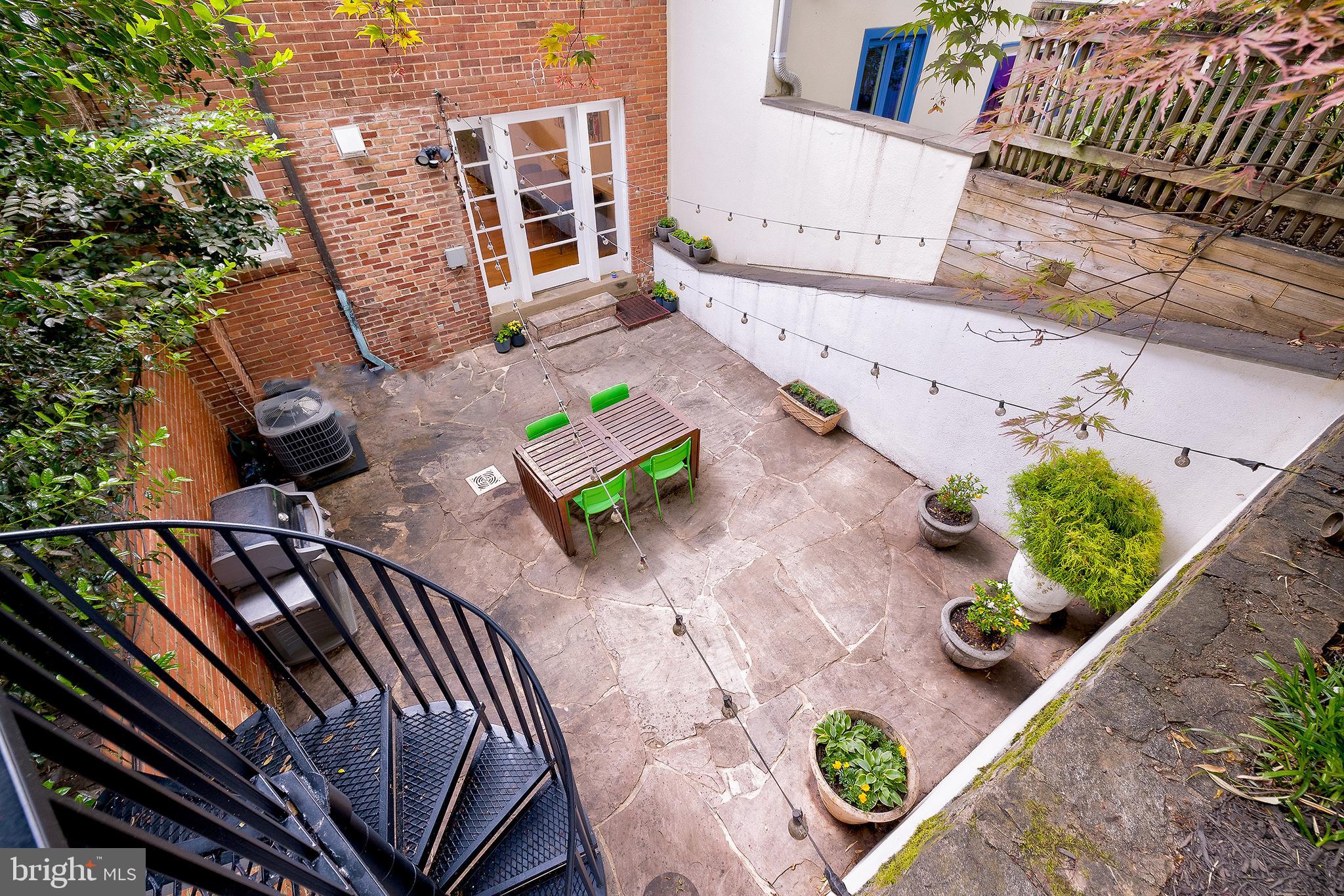 2135 Tunlaw Road Northwest Washington, DC 20007 - Photo 24 of 48 a view of an outdoor seating area