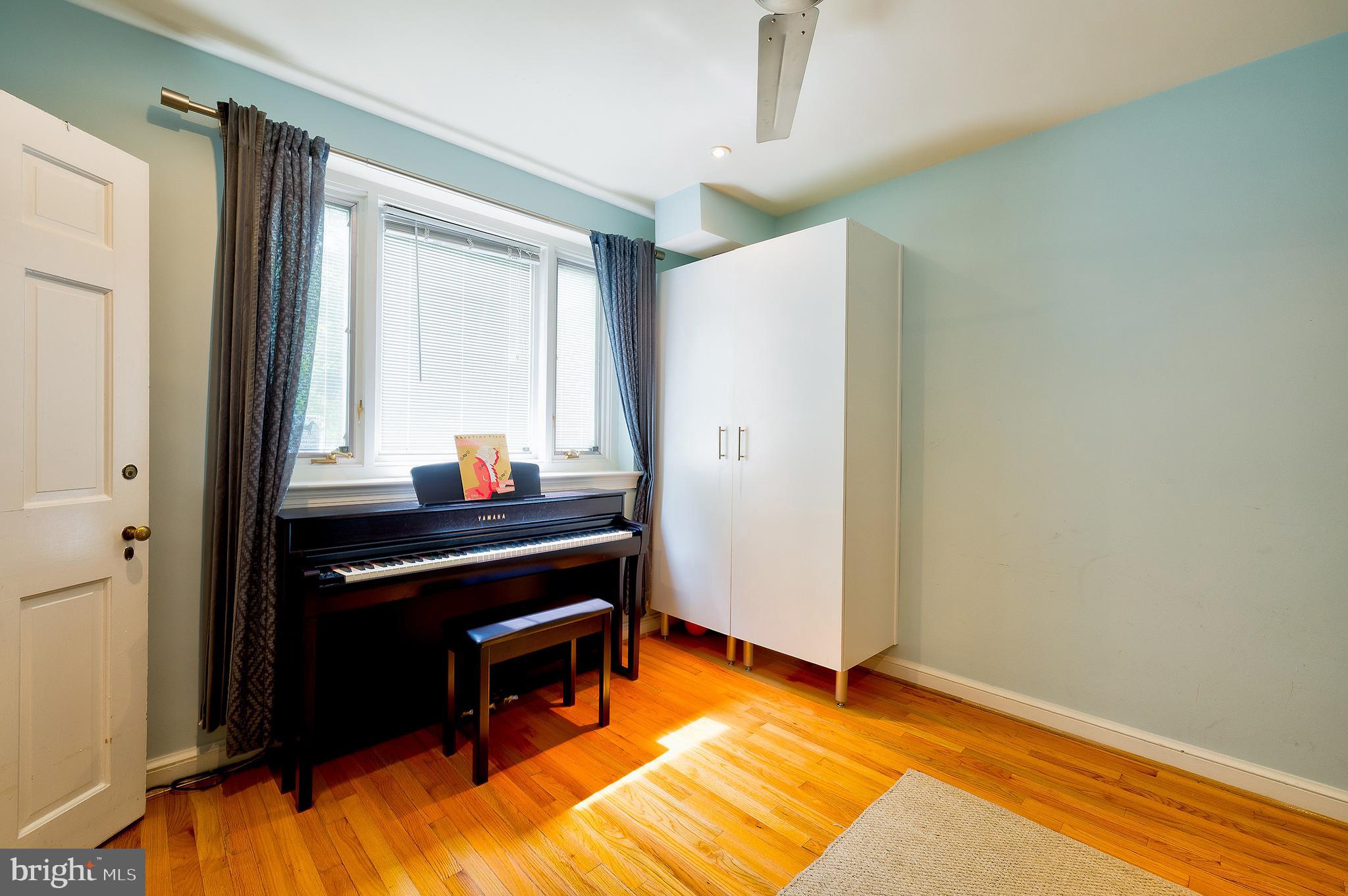 2135 Tunlaw Road Northwest Washington, DC 20007 - Photo 33 of 48 a view of room with furniture and a window