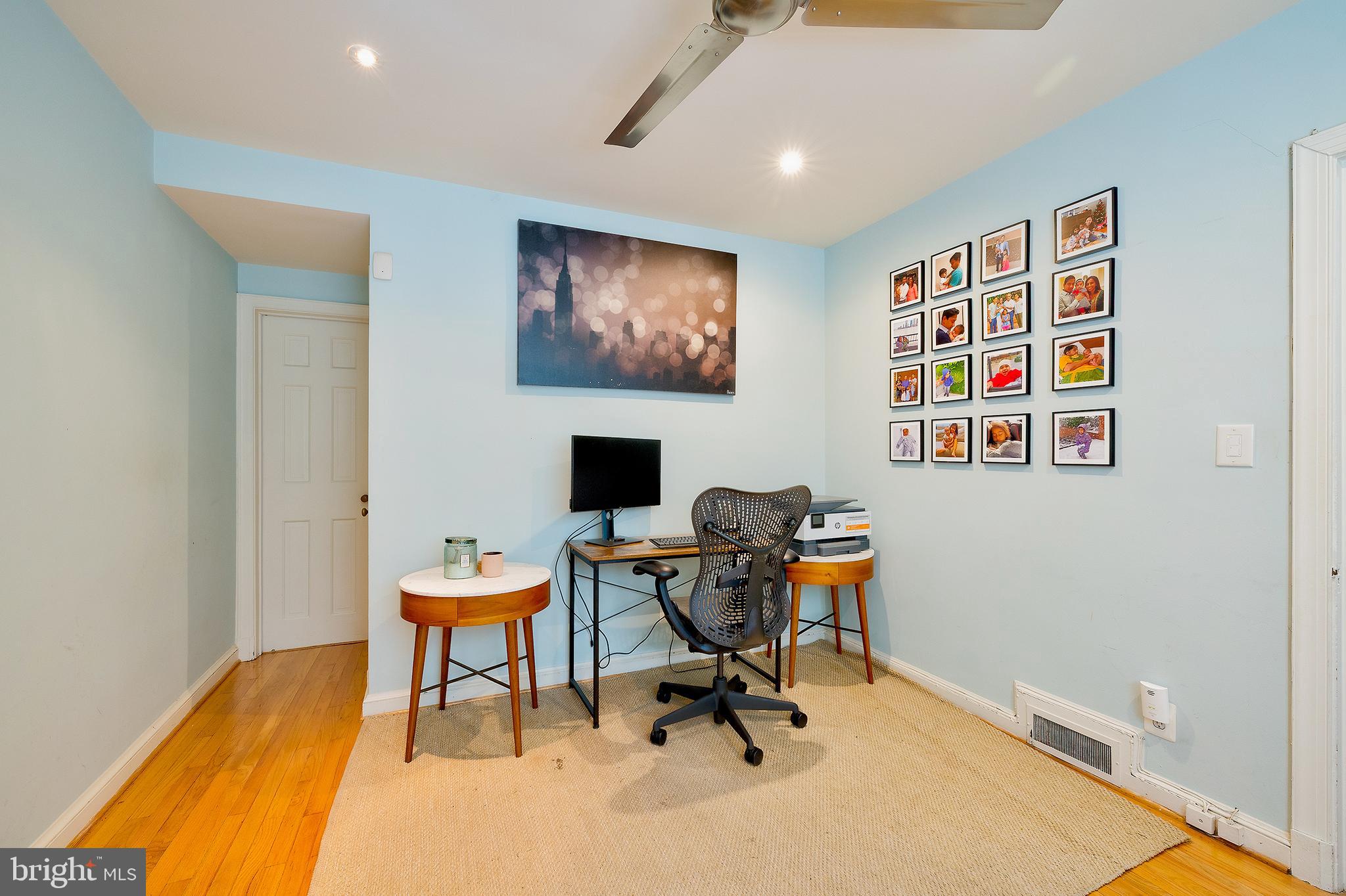 2135 Tunlaw Road Northwest Washington, DC 20007 - Photo 35 of 48 a view of a workspace with furniture