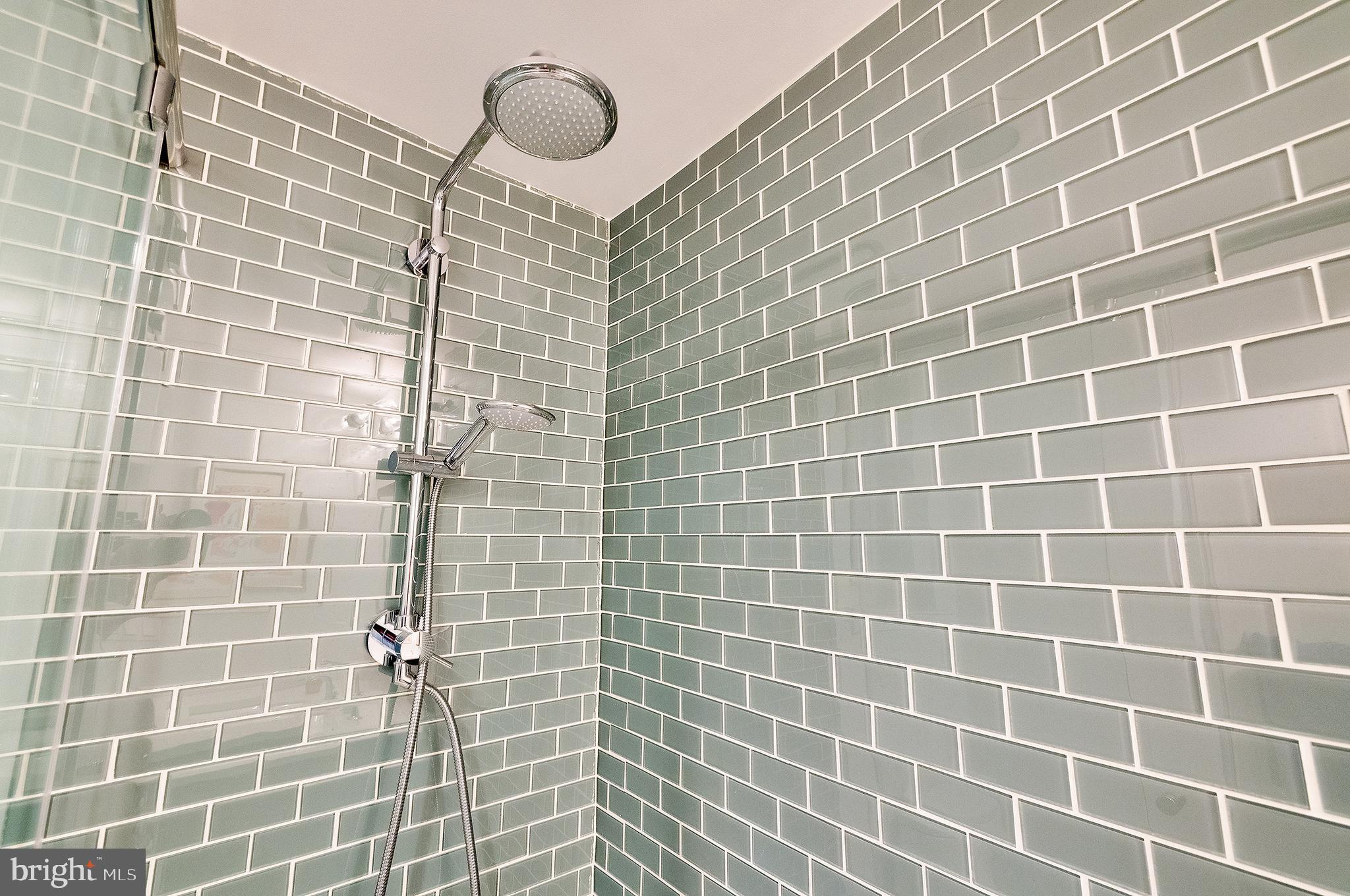 2135 Tunlaw Road Northwest Washington, DC 20007 - Photo 37 of 48 a bathroom with a shower