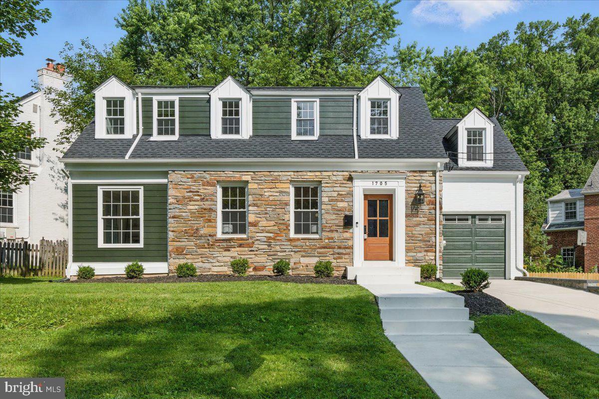 1705 Corwin Drive Silver Spring, MD 20910 - Photo 1 of 38 front view of a house with a yard