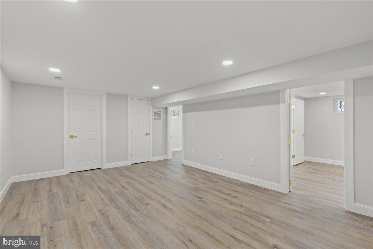1705 Corwin Drive Silver Spring, MD 20910 - Photo 28 of 38 a view of an empty room with wooden floor
