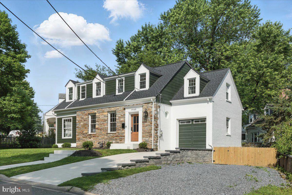 1705 Corwin Drive Silver Spring, MD 20910 - Photo 3 of 38 a front view of a house with a yard