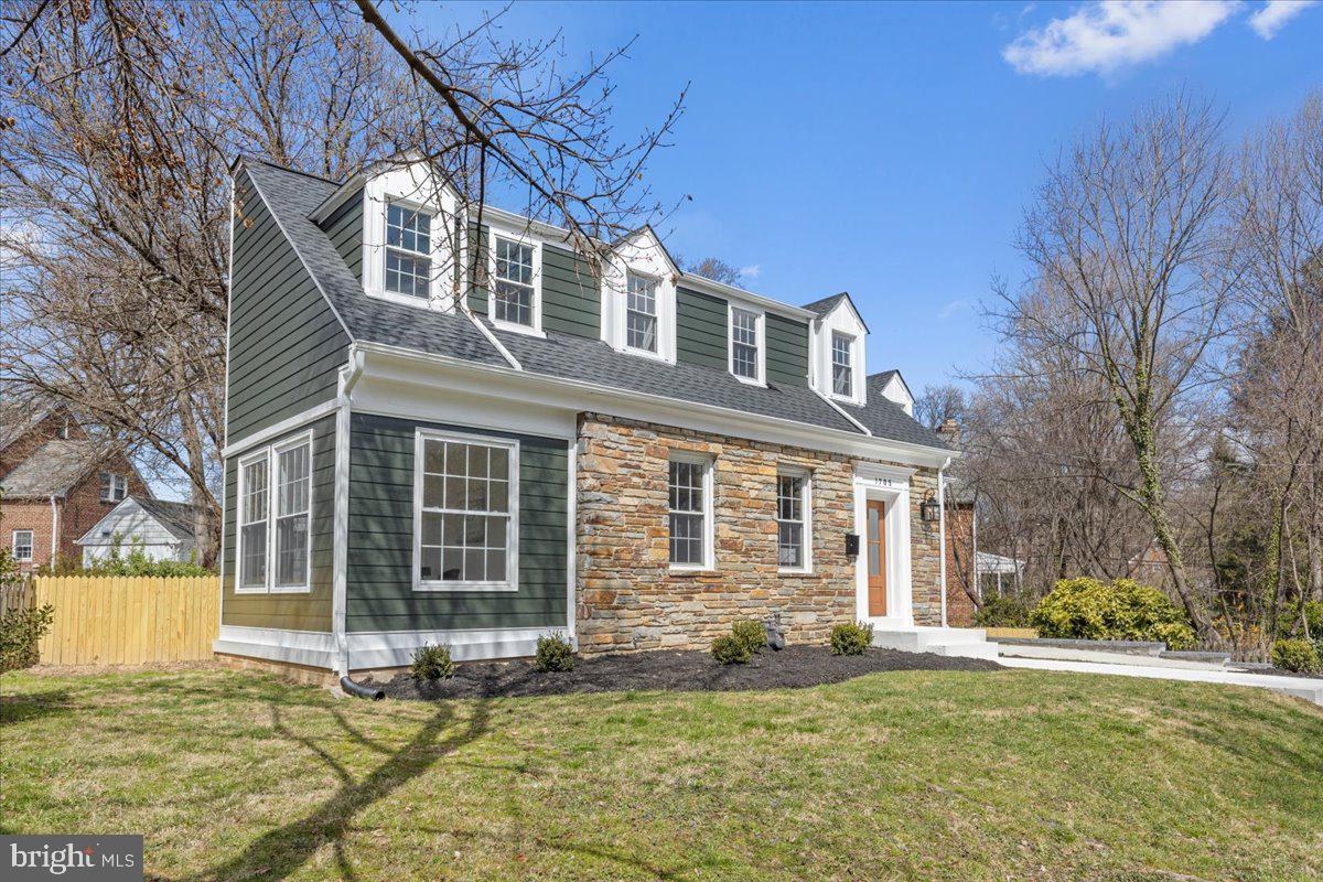 1705 Corwin Drive Silver Spring, MD 20910 - Photo 4 of 38 a house that has a big yard in front of it