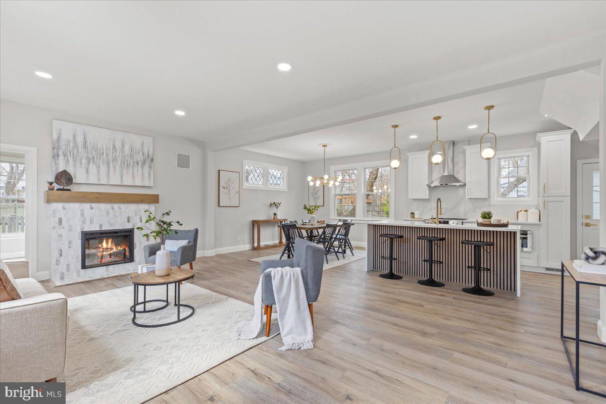 1705 Corwin Drive Silver Spring, MD 20910 - Photo 5 of 38 a living room with furniture and a fireplace