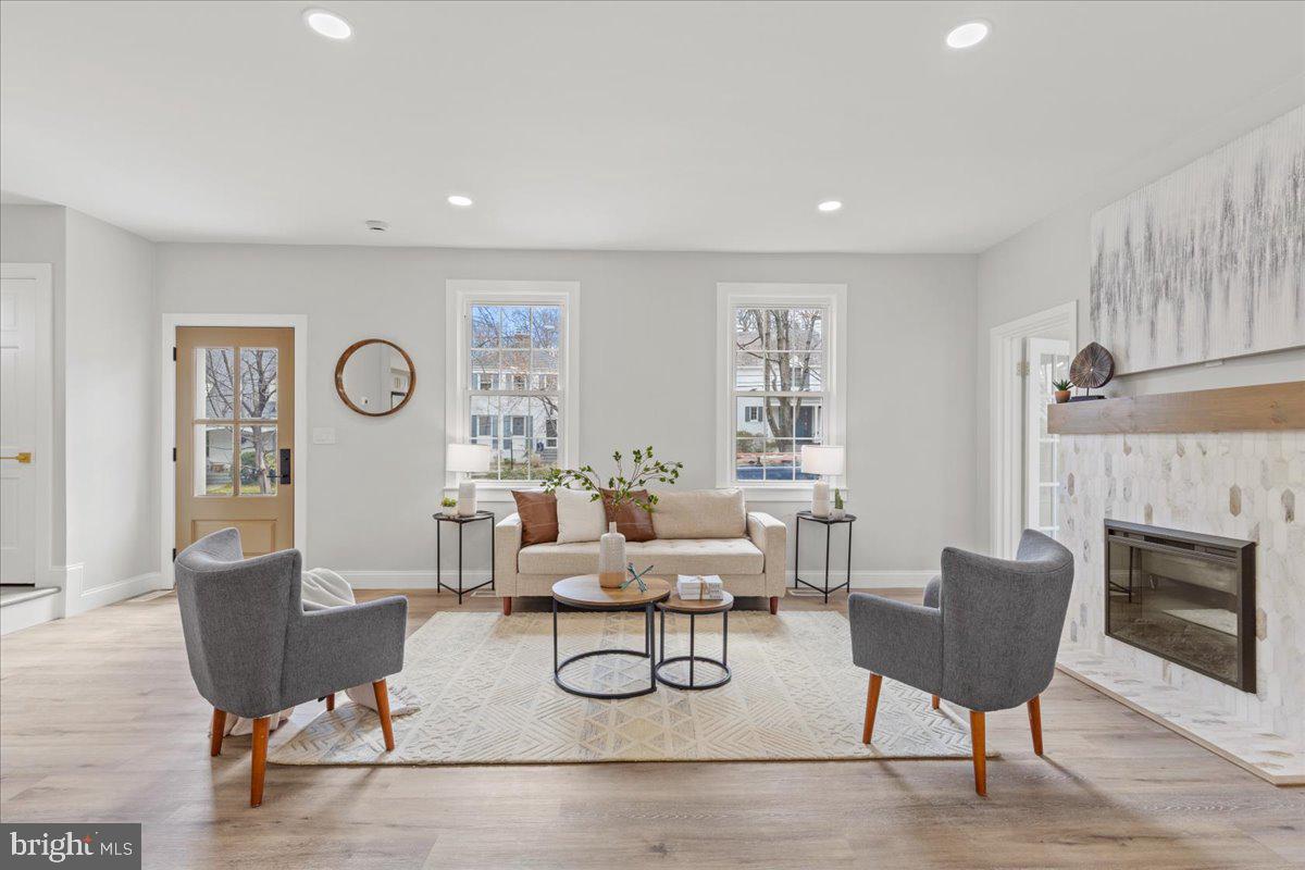 1705 Corwin Drive Silver Spring, MD 20910 - Photo 7 of 38 a living room with furniture and a fireplace