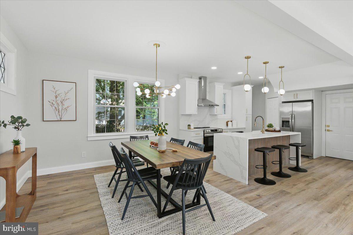 1705 Corwin Drive Silver Spring, MD 20910 - Photo 8 of 38 a view of a dining room with furniture and wooden floor