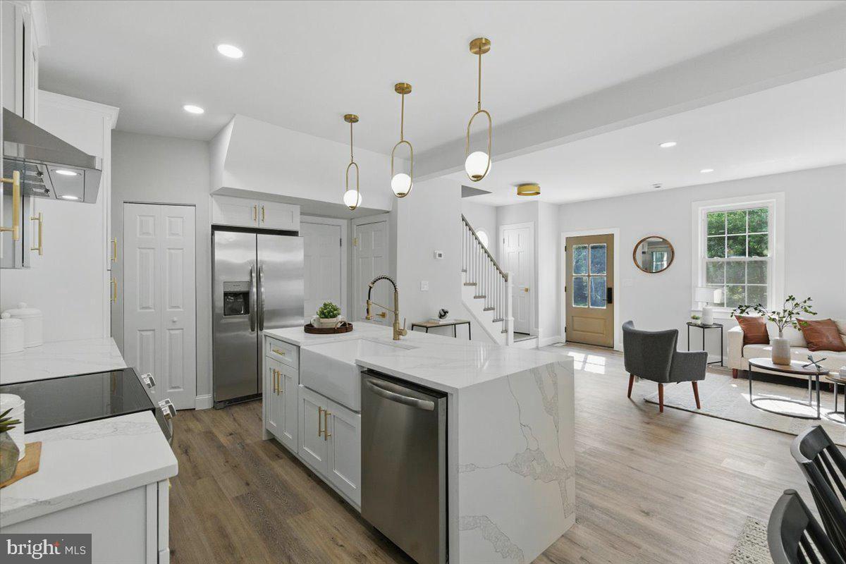 1705 Corwin Drive Silver Spring, MD 20910 - Photo 9 of 38 a large kitchen with a table and chairs