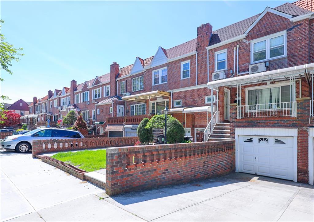 2046 Stuart Street Brooklyn, NY 11229 - Photo 2 of 27 a view of a brick building with a yard