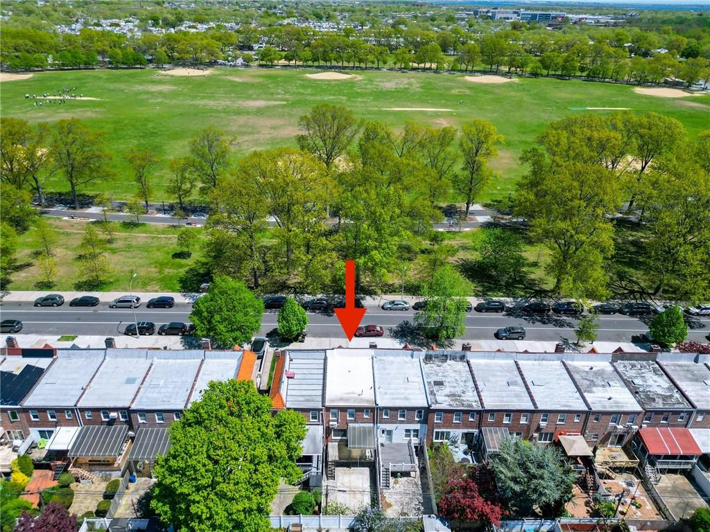 2046 Stuart Street Brooklyn, NY 11229 - Photo 24 of 27 an aerial view of a house with a garden and lake view