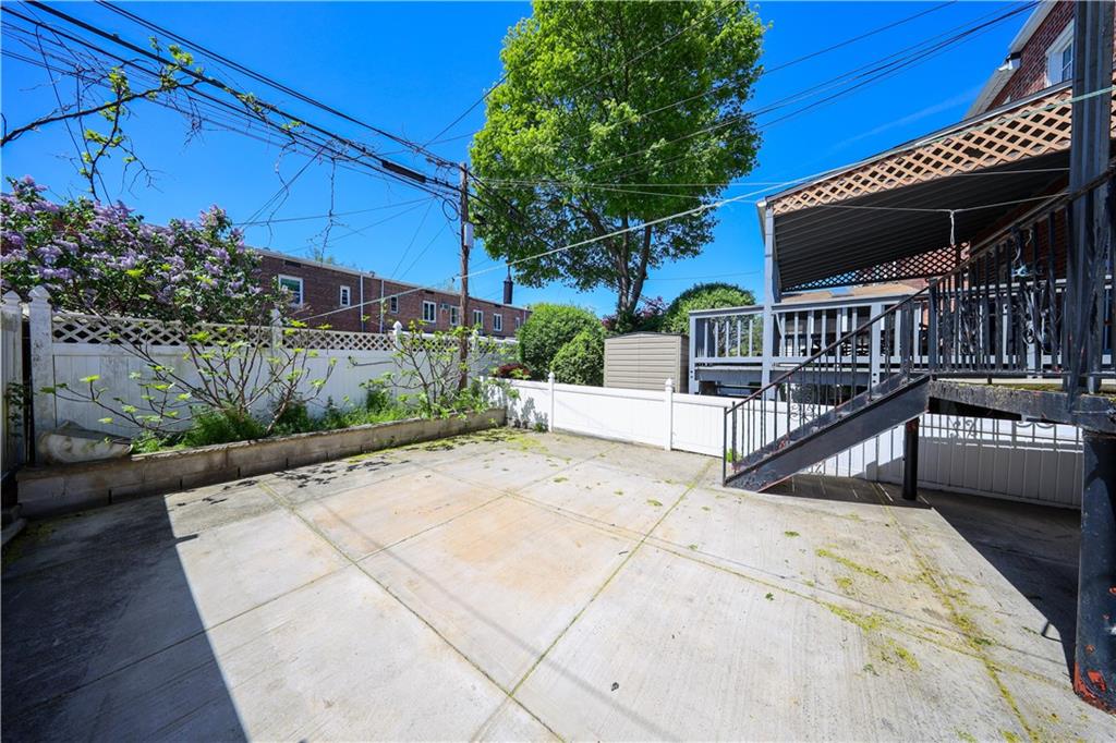 2046 Stuart Street Brooklyn, NY 11229 - Photo 4 of 27 a view of a house with backyard and sitting area