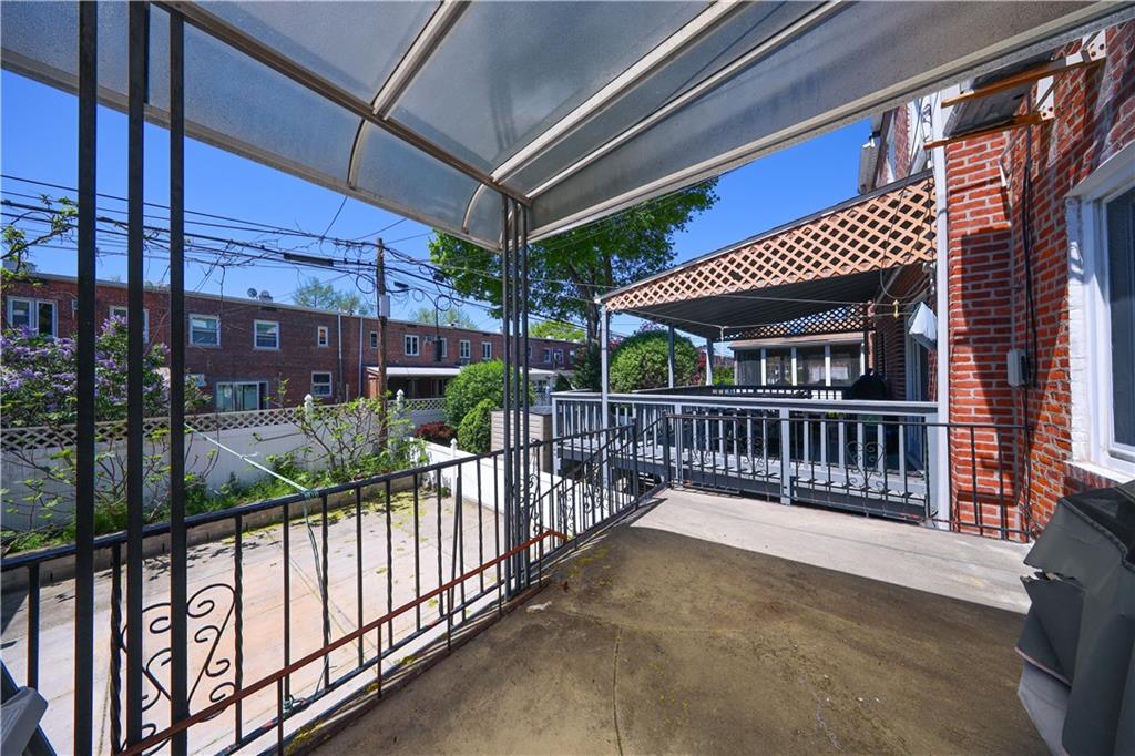 2046 Stuart Street Brooklyn, NY 11229 - Photo 5 of 27 a view of a house with a balcony