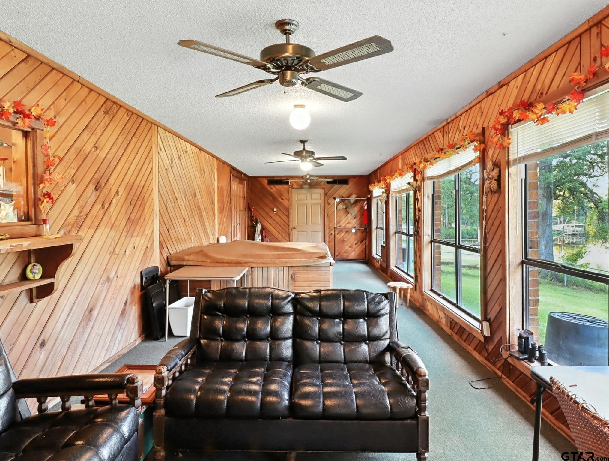 402 Watson Road Gladewater, TX 75647 - Photo 13 of 32 a bed room with a bed and a window