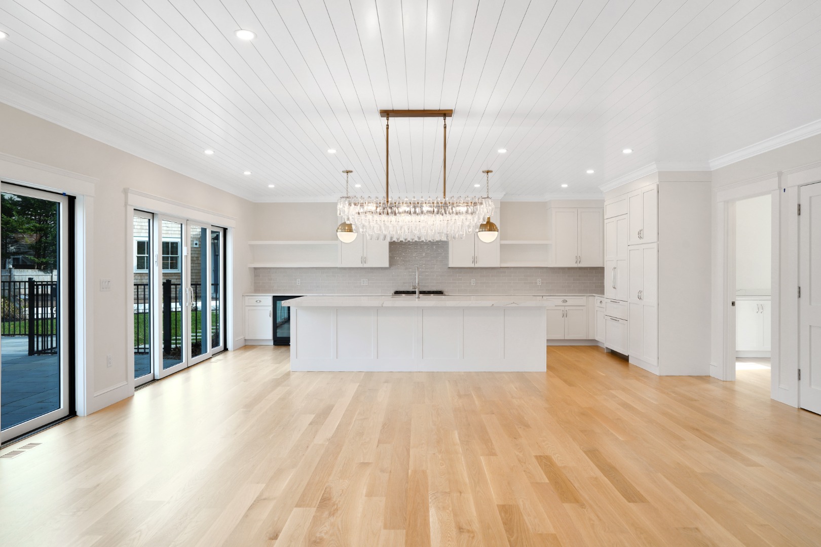 23 Pinehurst Road Edgartown, MA 02539 - Photo 13 of 57 a large kitchen with stainless steel appliances kitchen island a large island in the center