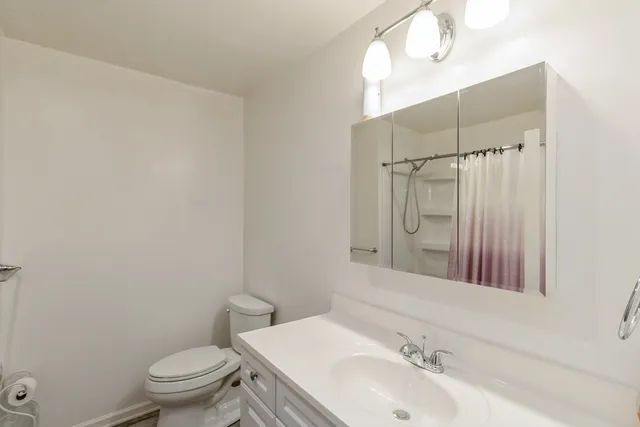 a workspace with furniture and window