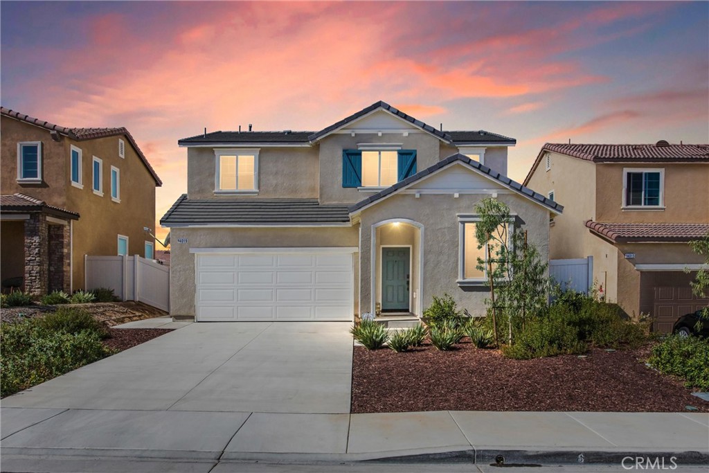 14019 Dandolo Lane Beaumont, CA 92223 - Photo 2 of 34 a front view of a house with garden