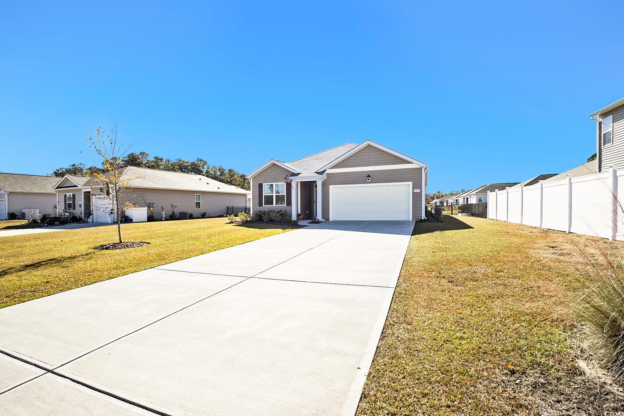 409 Samara Drive Longs, SC 29568 - Photo 3 of 40 View of front of house featuring driveway