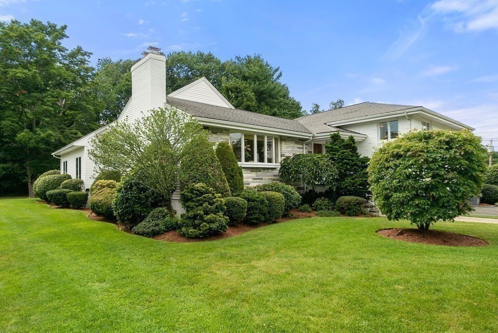 71 Sevland Road Newton, MA 02459 - Photo 24 of 28 a front view of a house with a yard