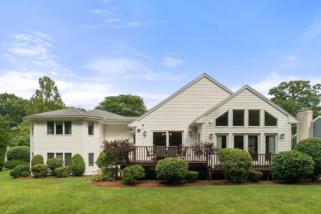 71 Sevland Road Newton, MA 02459 - Photo 3 of 28 a front view of a house with a garden