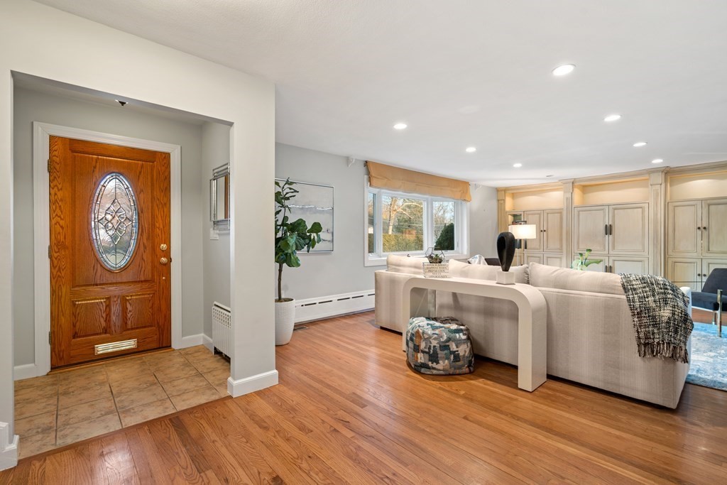 71 Sevland Road Newton, MA 02459 - Photo 5 of 28 a living room with furniture and a large window